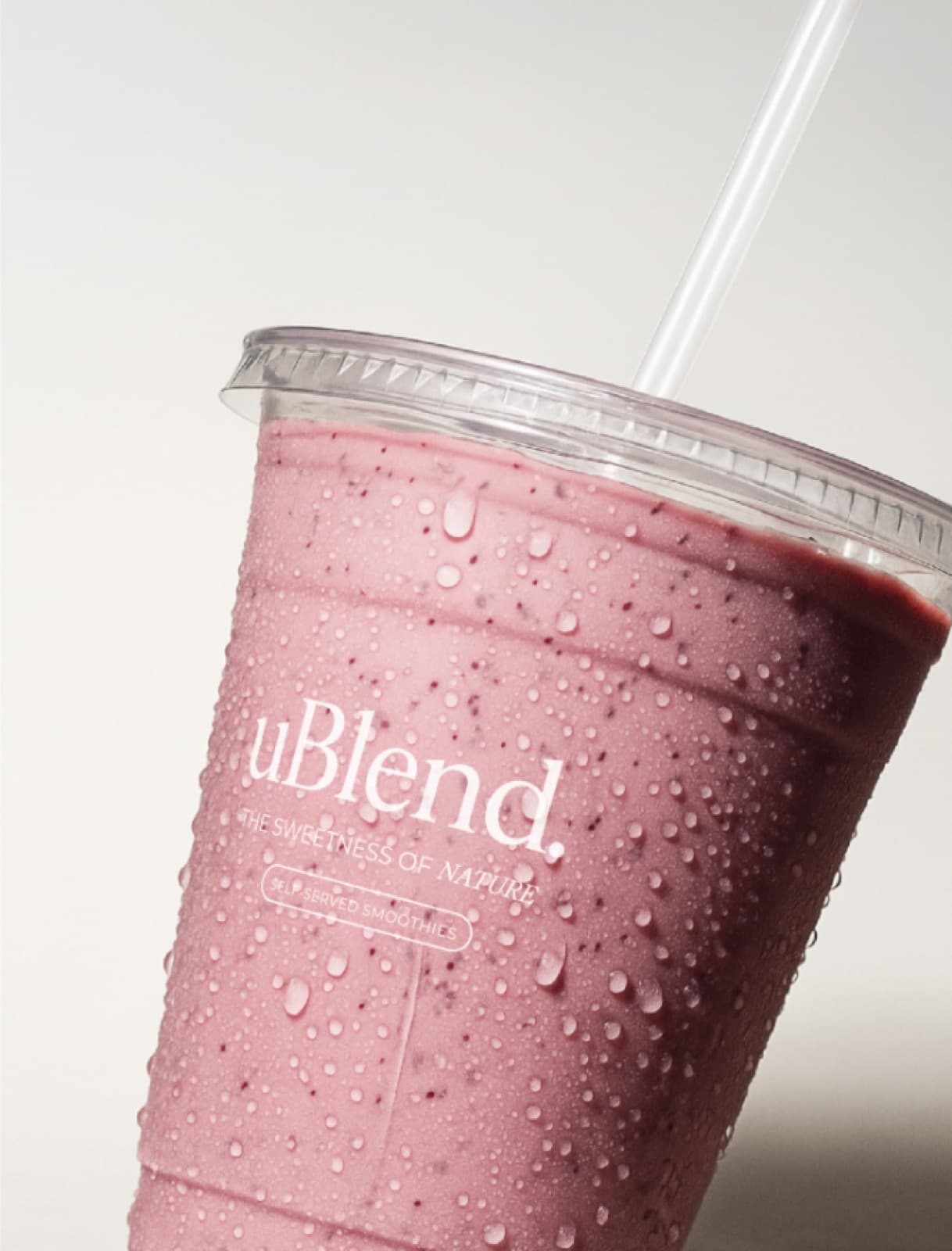 uBlend Mixed Berry smoothie in a branded cup